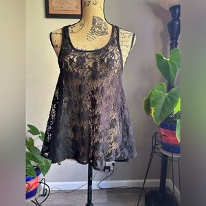 I’m selling this Rock y Roll cowgirl lace french connection tank top S